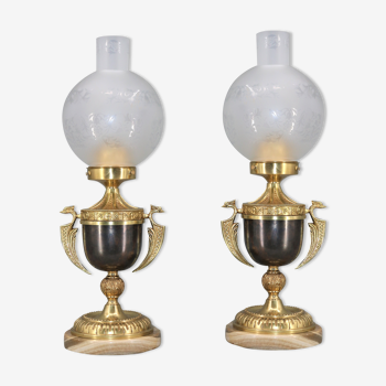 Pair of lamps in patinated gilded bronze and swollen glass