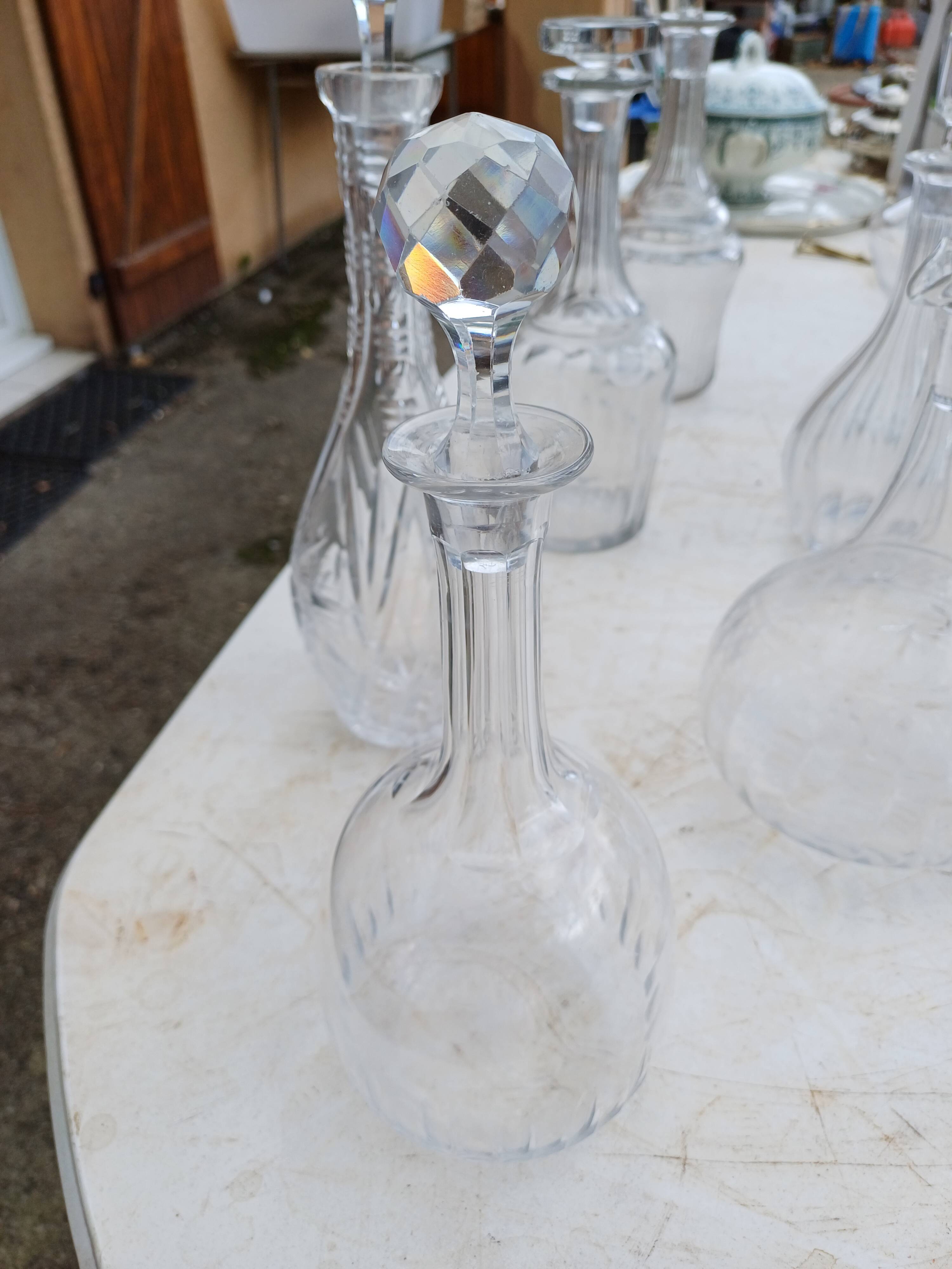 Set of 18 glass and crystal carafes