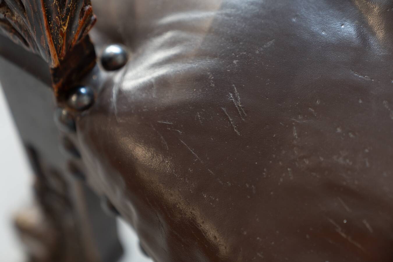 19th century beechwood, metal, and leather throne