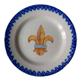 18th century earthenware decorative plate signed Saint Clement with royal coat of arms decoration