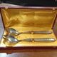 Silver-plated salad cutlery in their case.
