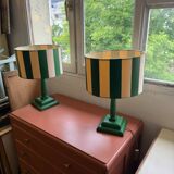 Pair of wooden bedside lamps with striped lampshades