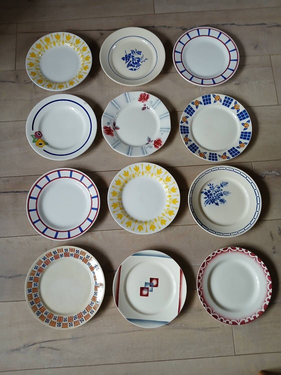12 mismatched antique dinner plates