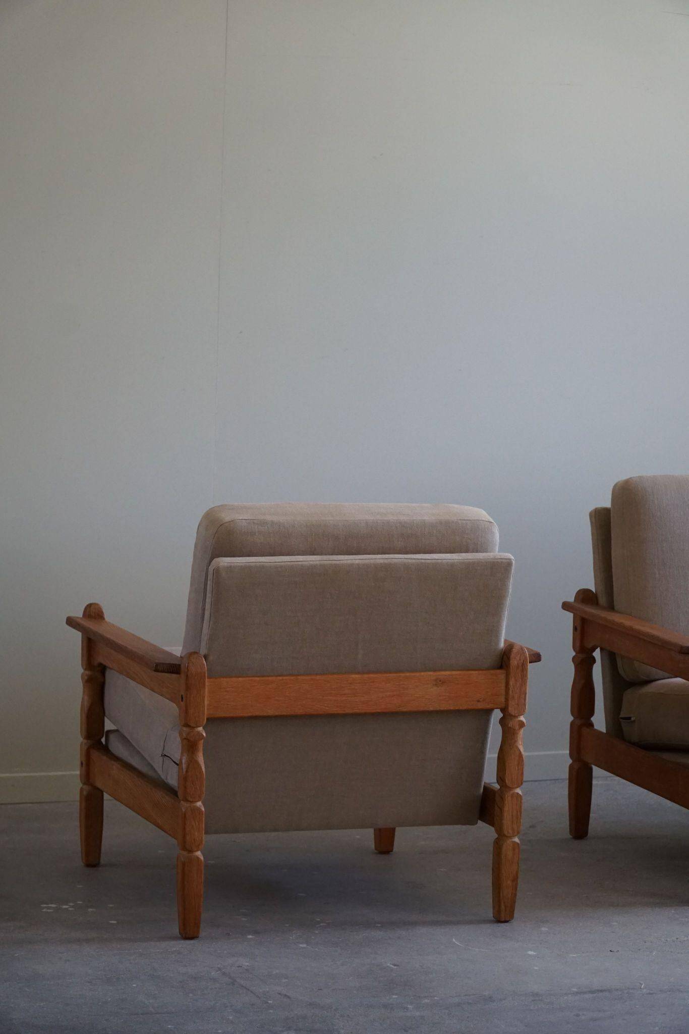 Modern Danish, Pair of Lounge Armchairs in Oak and Linen, Henning Kjærnulf, 1960s