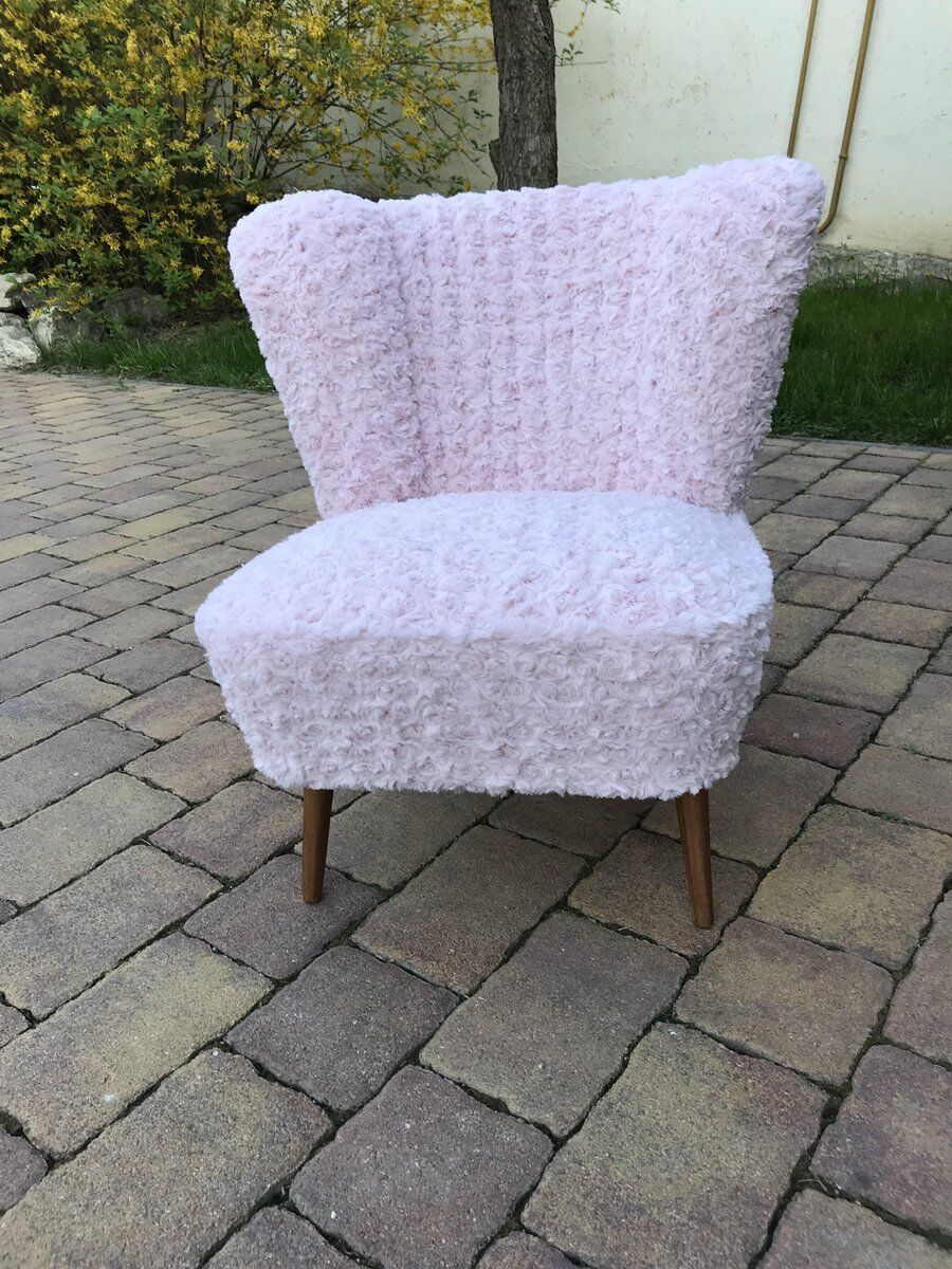 Mid-century cocktail chair in pink faux fur, solid beech legs, vintage style.