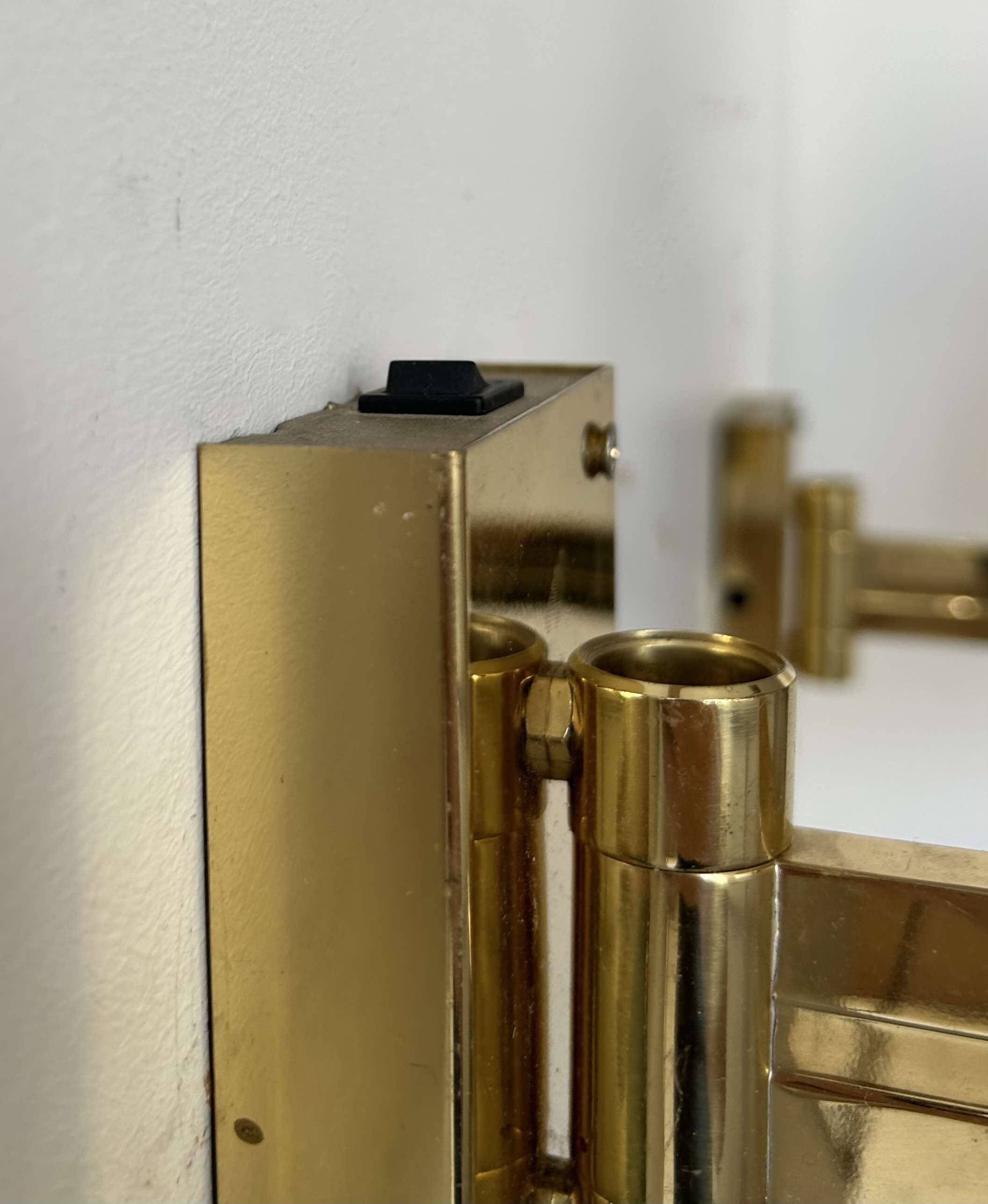 Pair of vintage adjustable wall lights, solid brass, Sweden 1970