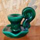 Green earthenware candle holder