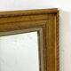 Louis XVI style wood and gilded stucco mirror