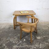 Old curved wooden children's desk.