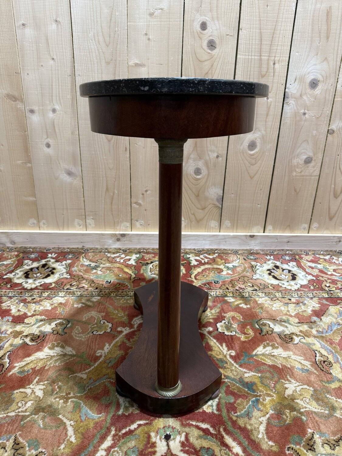 Small oval side table in Empire style