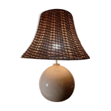 Ceramic lamp with rattan lampshade.