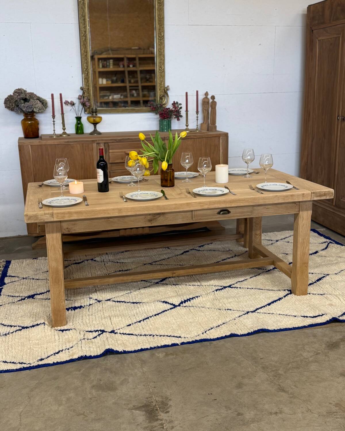 Solid oak extendable farmhouse table with 2 drawers.