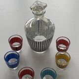 Liquor service consisting of a carafe and 6 small shot glasses, vintage houndstooth pattern