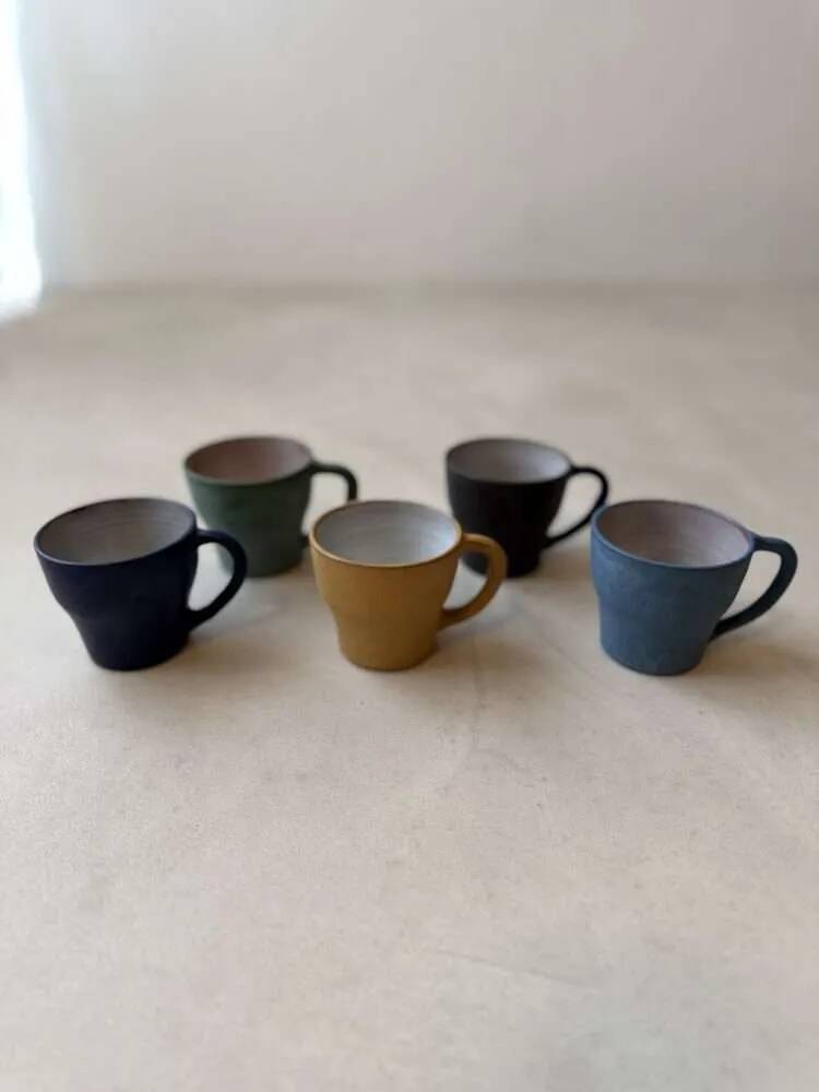 Set of five mugs from a 1960s Scandinavian studio.