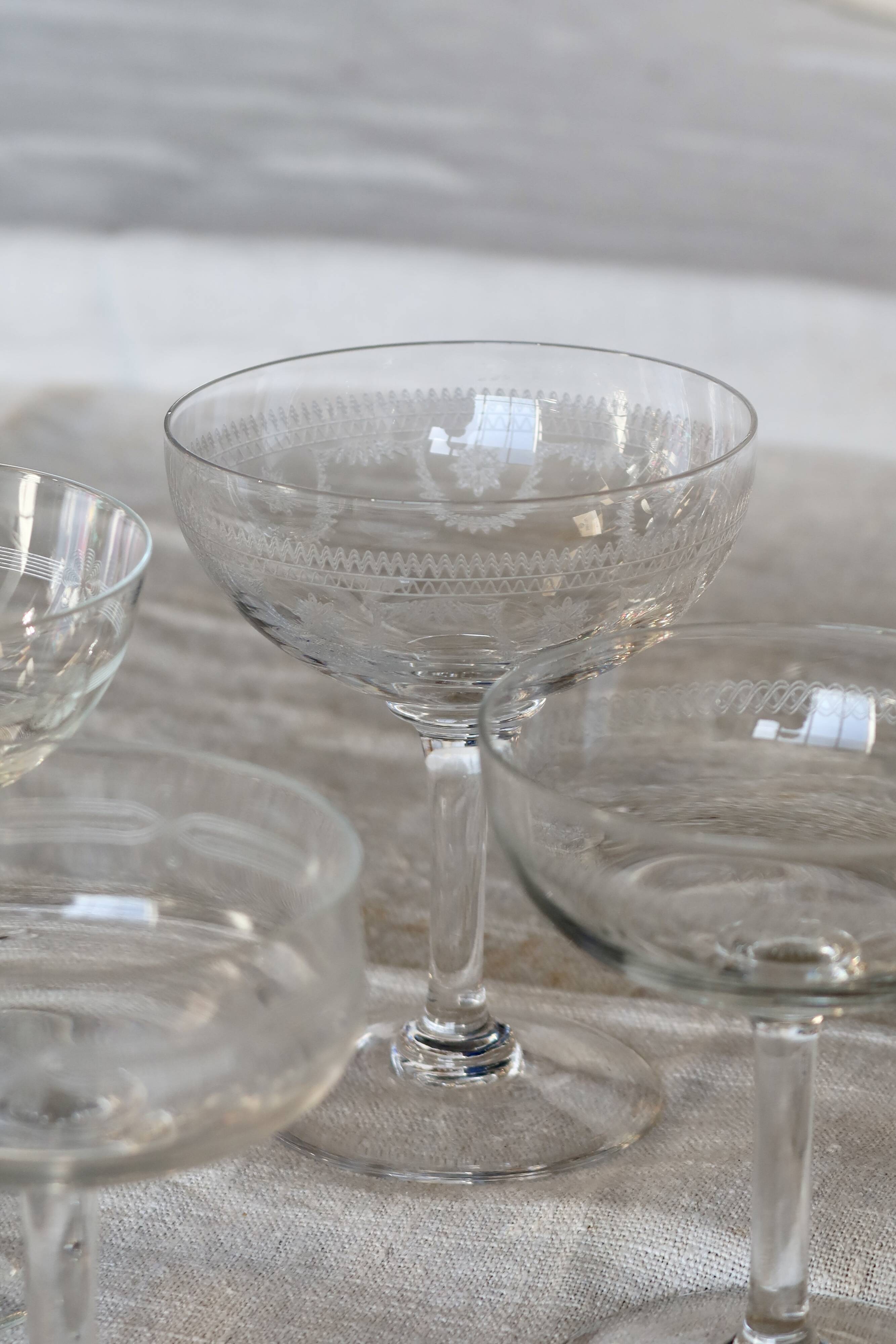 Mismatched vintage cut crystal champagne glasses