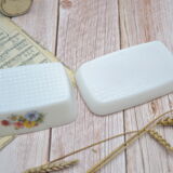 White butter dish in Arcopal with floral/country motif