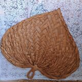 Heart fan in vintage woven palm leaves