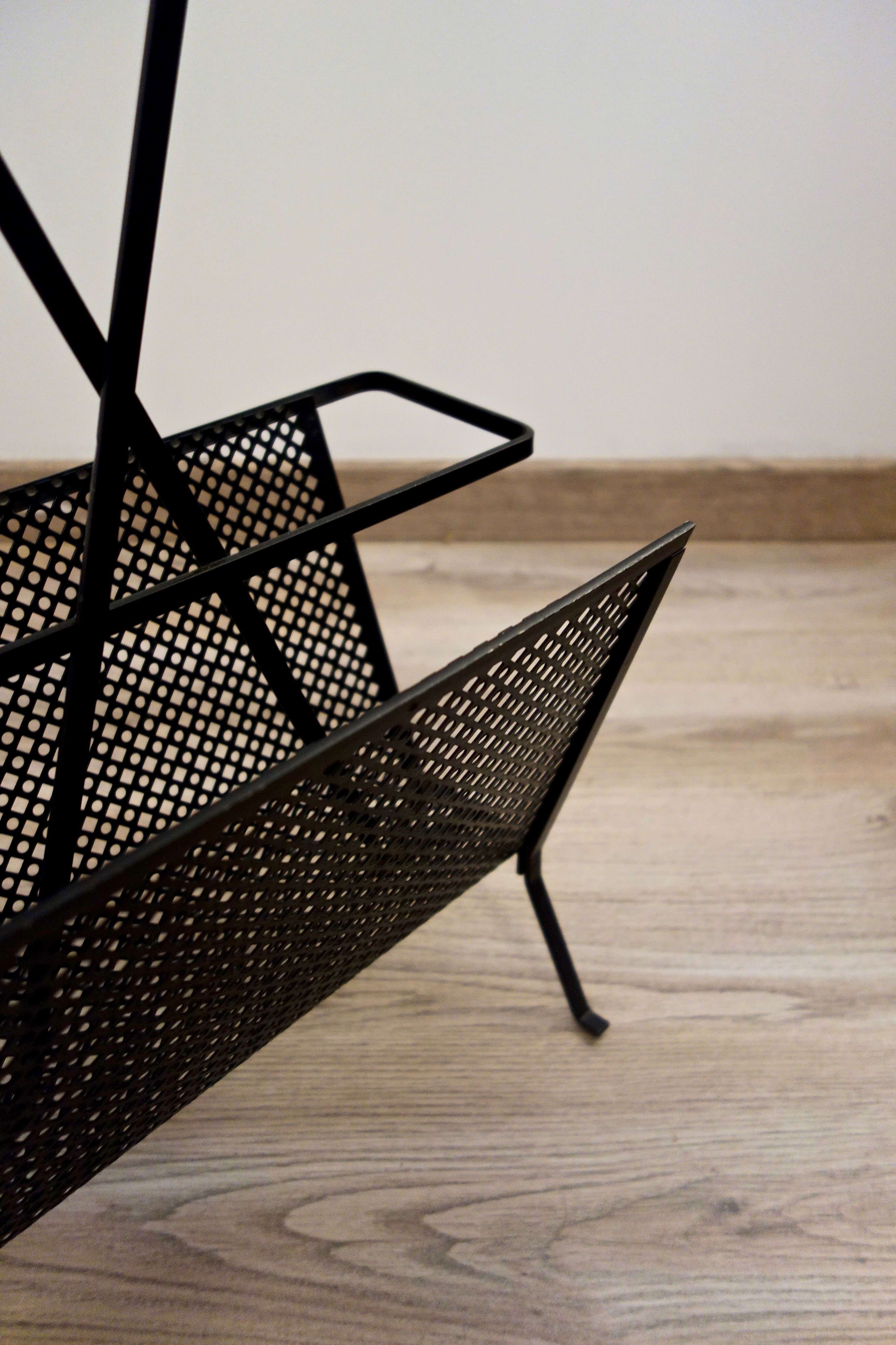 Mathieu Matégot's magazines rack from the 1950s