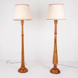 Pair of turned wooden floor lamps in Art Deco style, France, mid-20th century.
