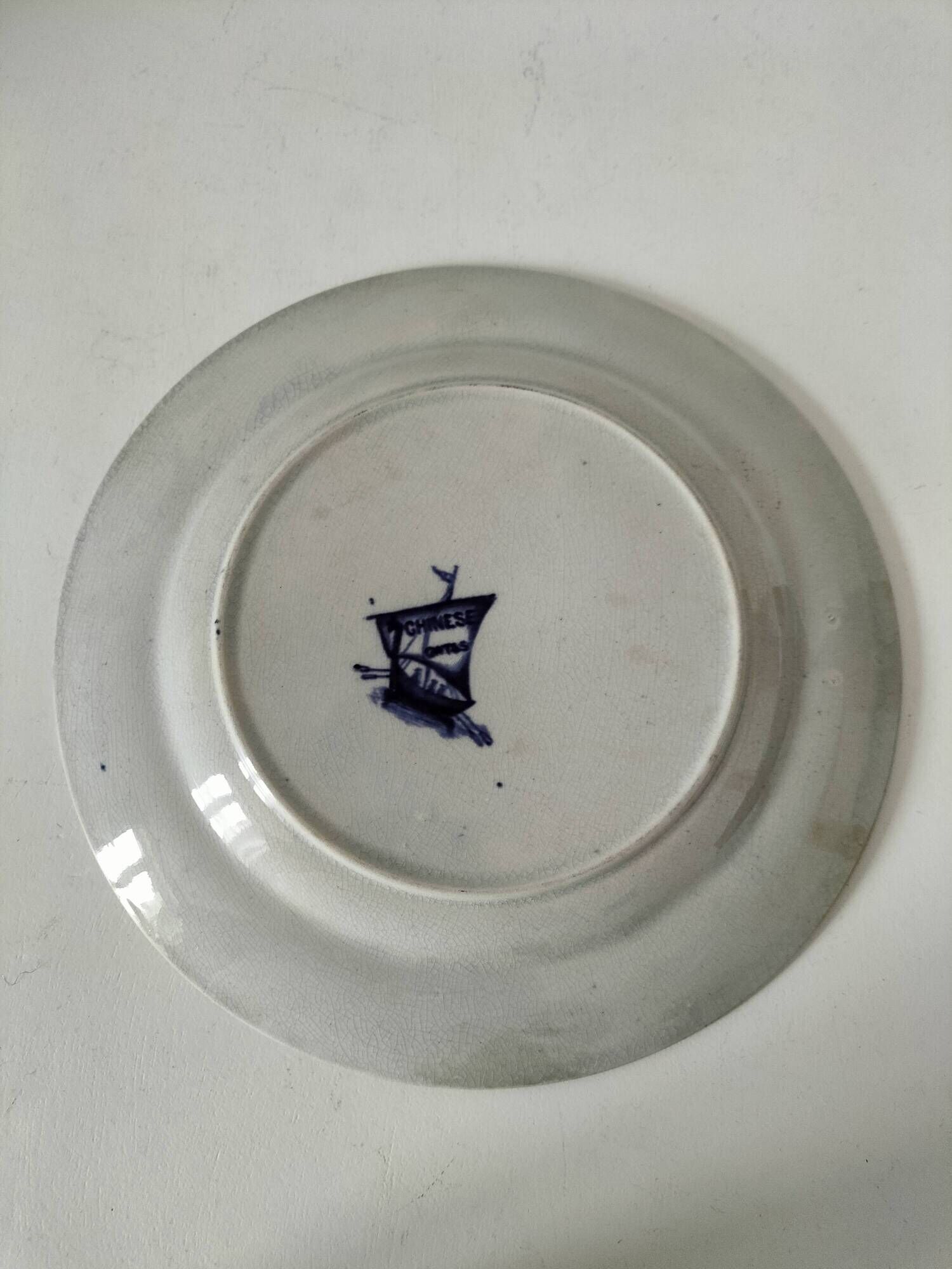 Antique plate with Chinese blue oriental decoration from the late 19th century.