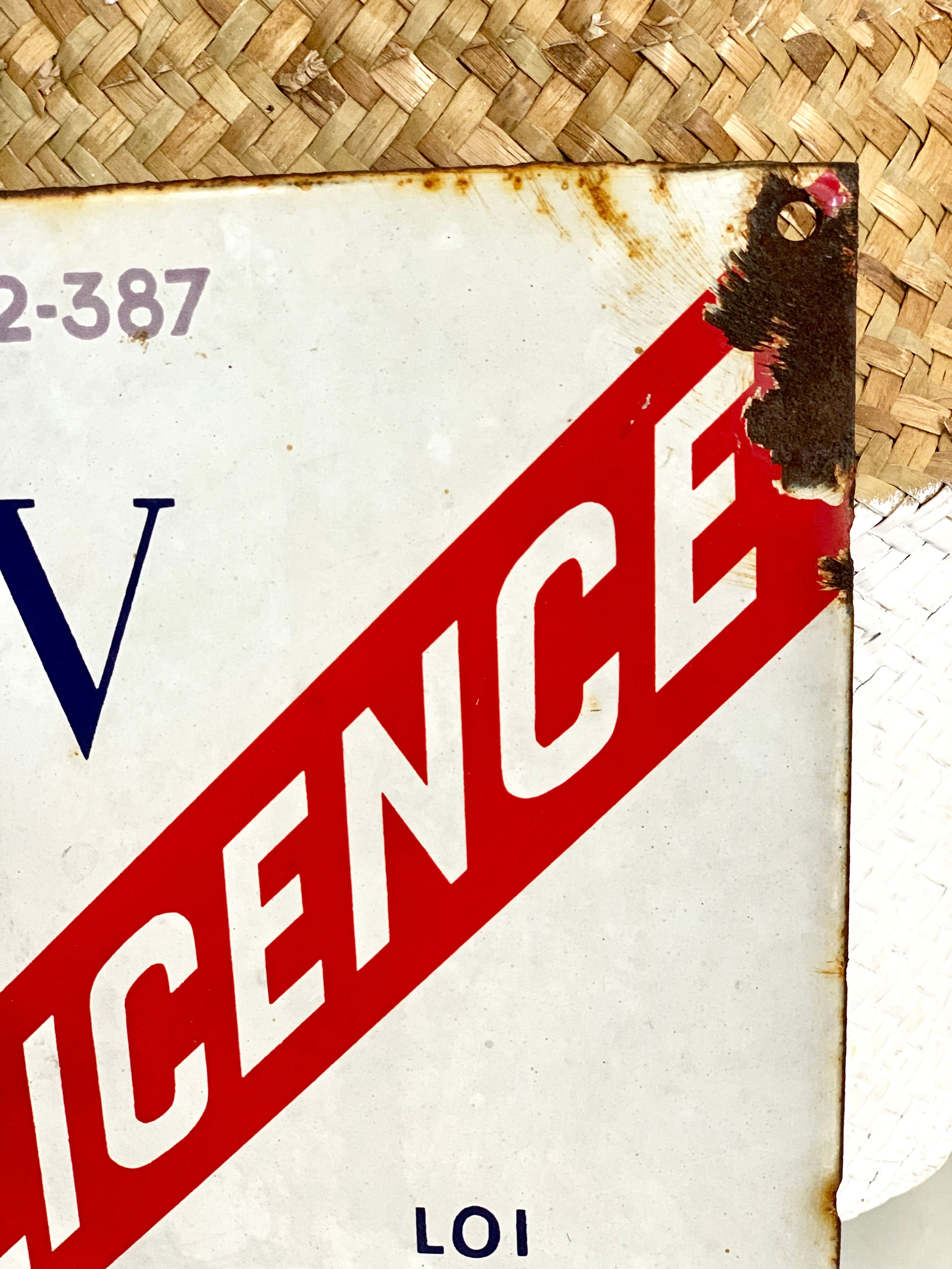 Old enamelled plate license IV