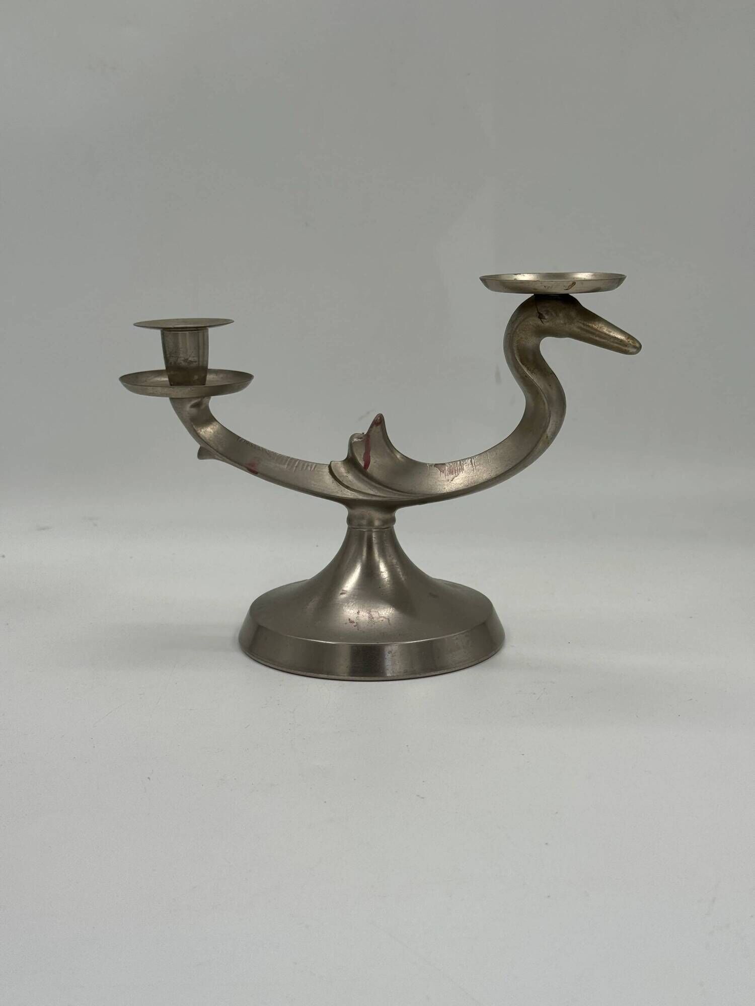 Vintage sculptural candelabrum with two lights in the shape of a bird.
