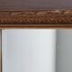 Miroir en bois stuc doré et verre biseauté