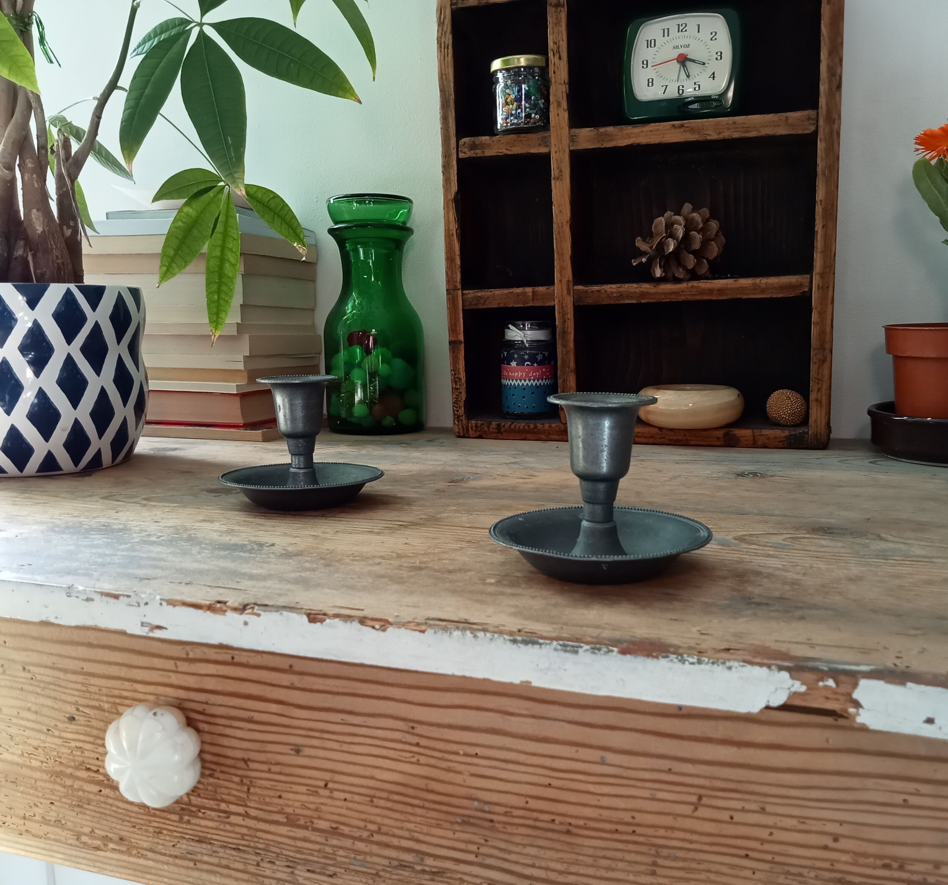 Pair of antique pewter candle holders