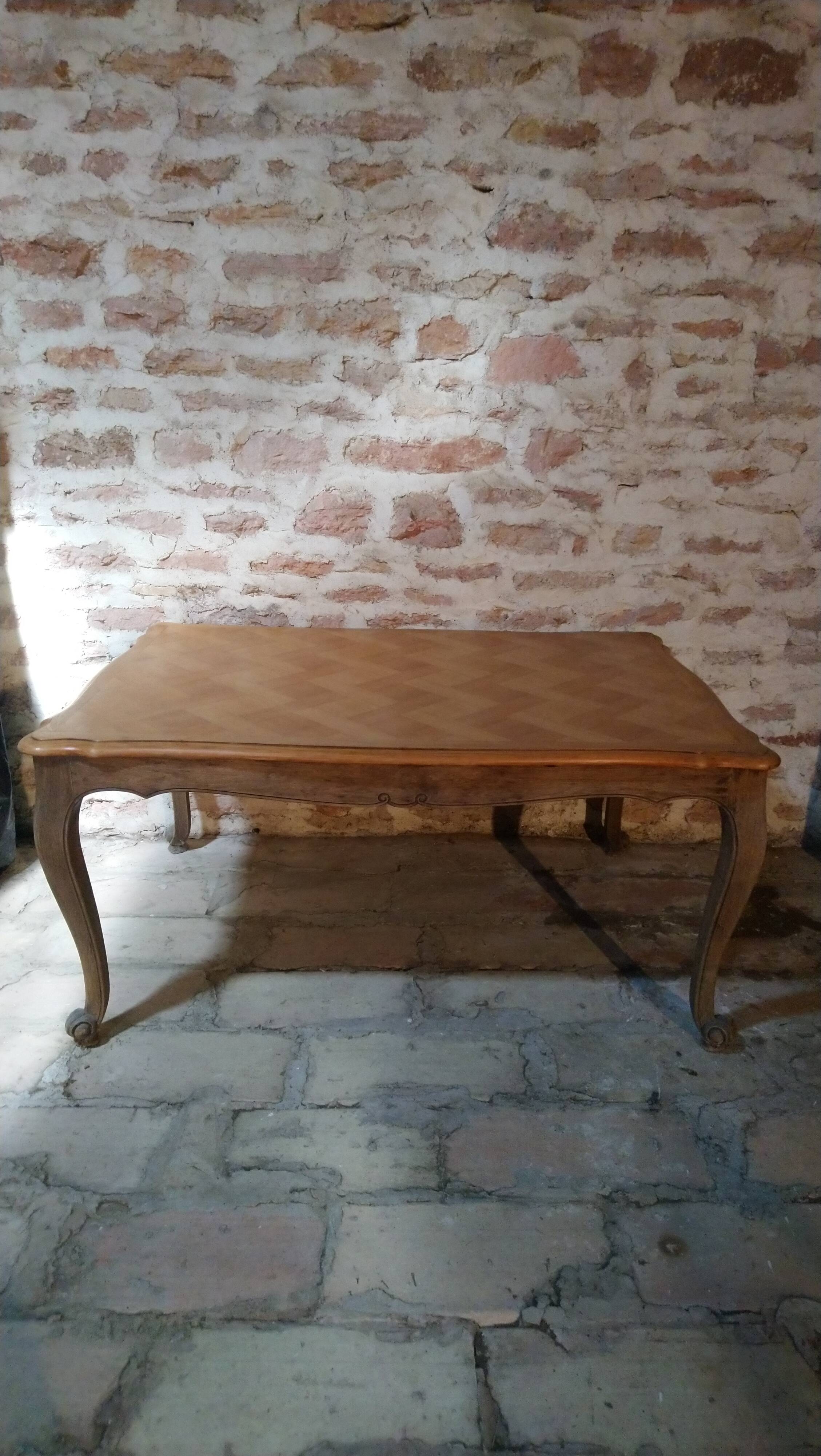 Louis XV style table in oak and cherry wood.