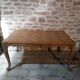 Louis XV style table in oak and cherry wood.