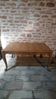 Louis XV style table in oak and cherry wood.