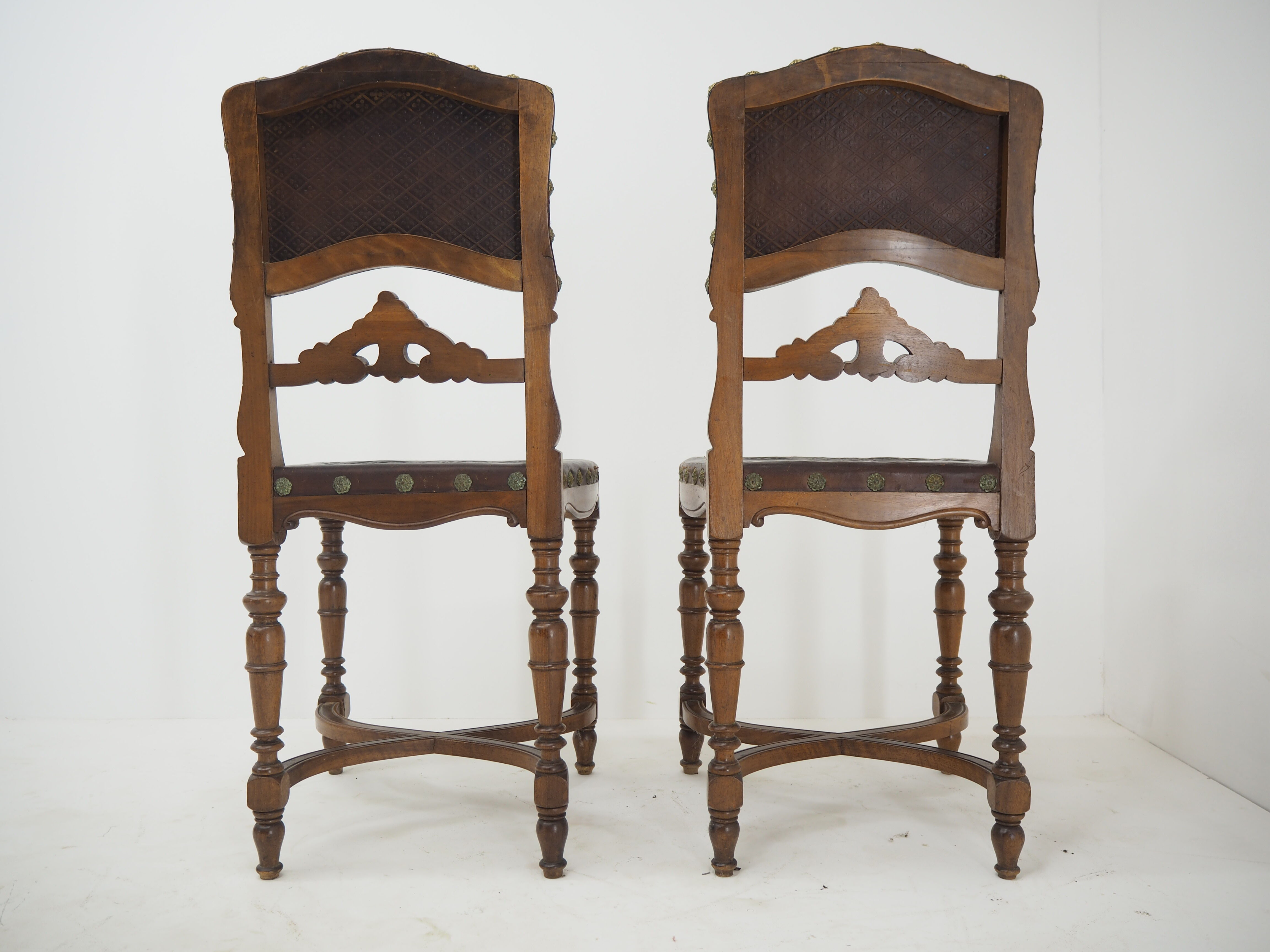 Pair of Antique Embossed Leather Chairs