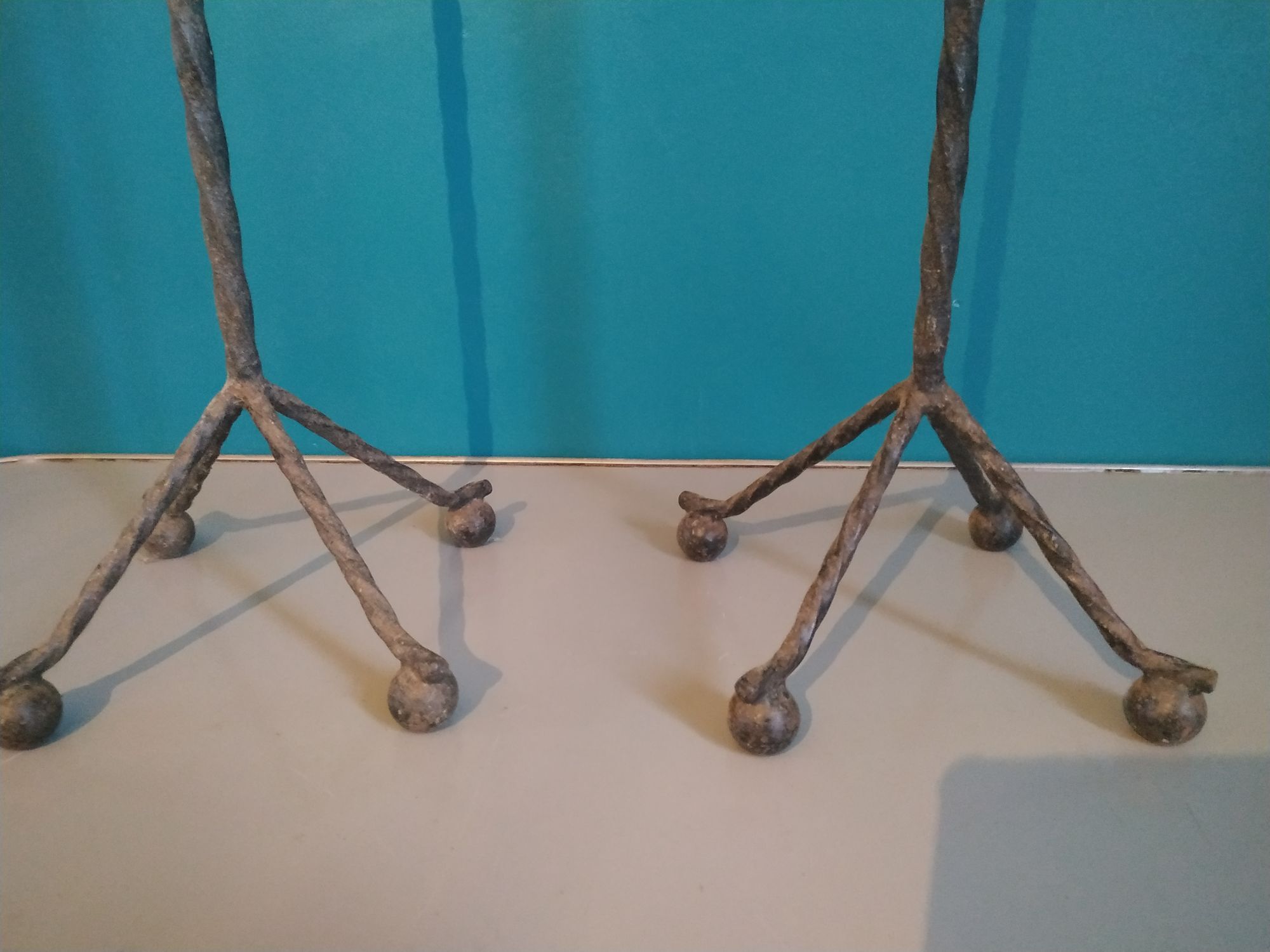 Old pair of wrought iron chimney landiers