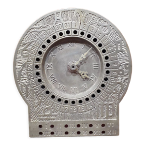 Horloge en laiton massif signes
