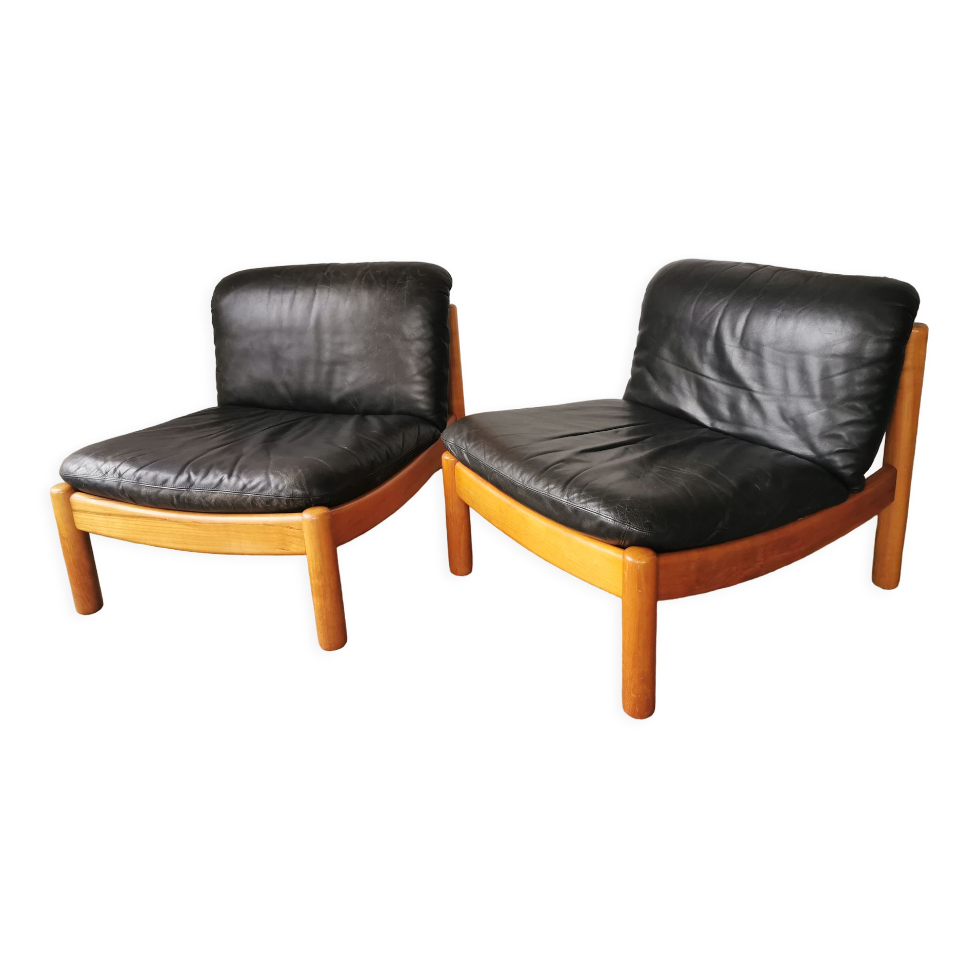Pair of designer leather armchairs 80s