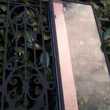 Porte d’entrée ancienne en chêne vitrée grilles en fonte 1925