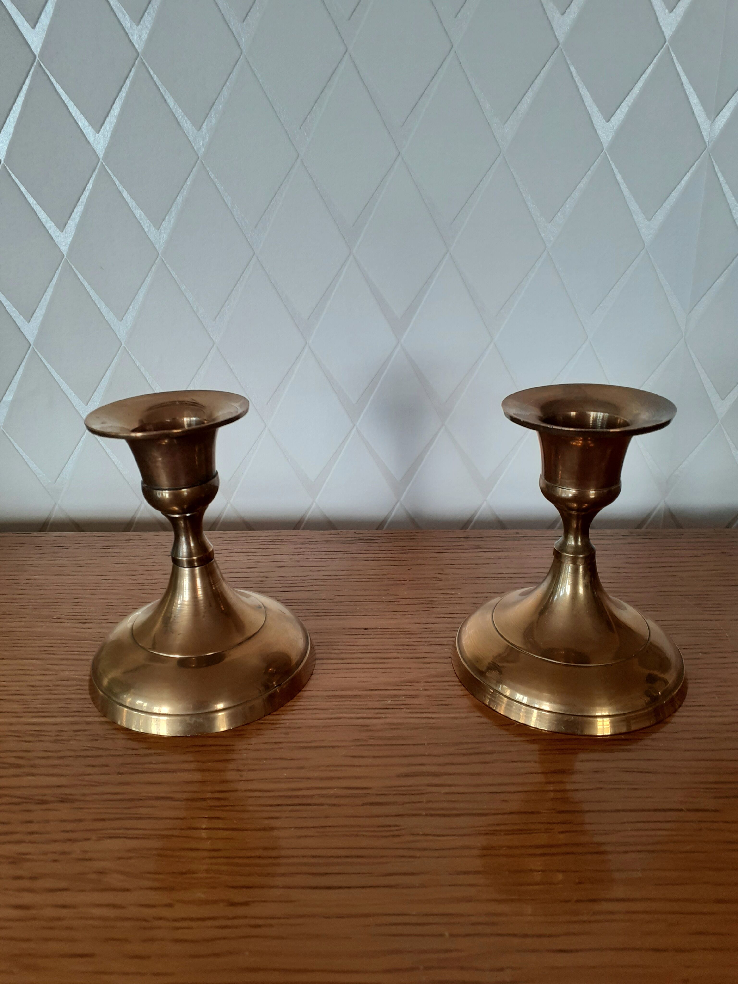 Pair of brass candle holders