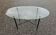 Oval glass and brass coffee table 1950