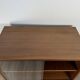 Teak bookshelf, sliding display + open storage, 60s/70s