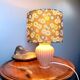 Coral tar ceramic lamp, khaki lampshade with flowers.