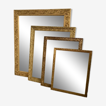 ensemble de 4 miroirs en bois et stuc doré début XXème