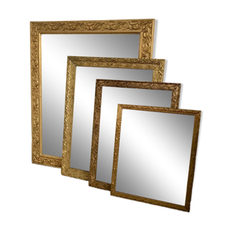 ensemble de 4 miroirs en bois et stuc doré début XXème