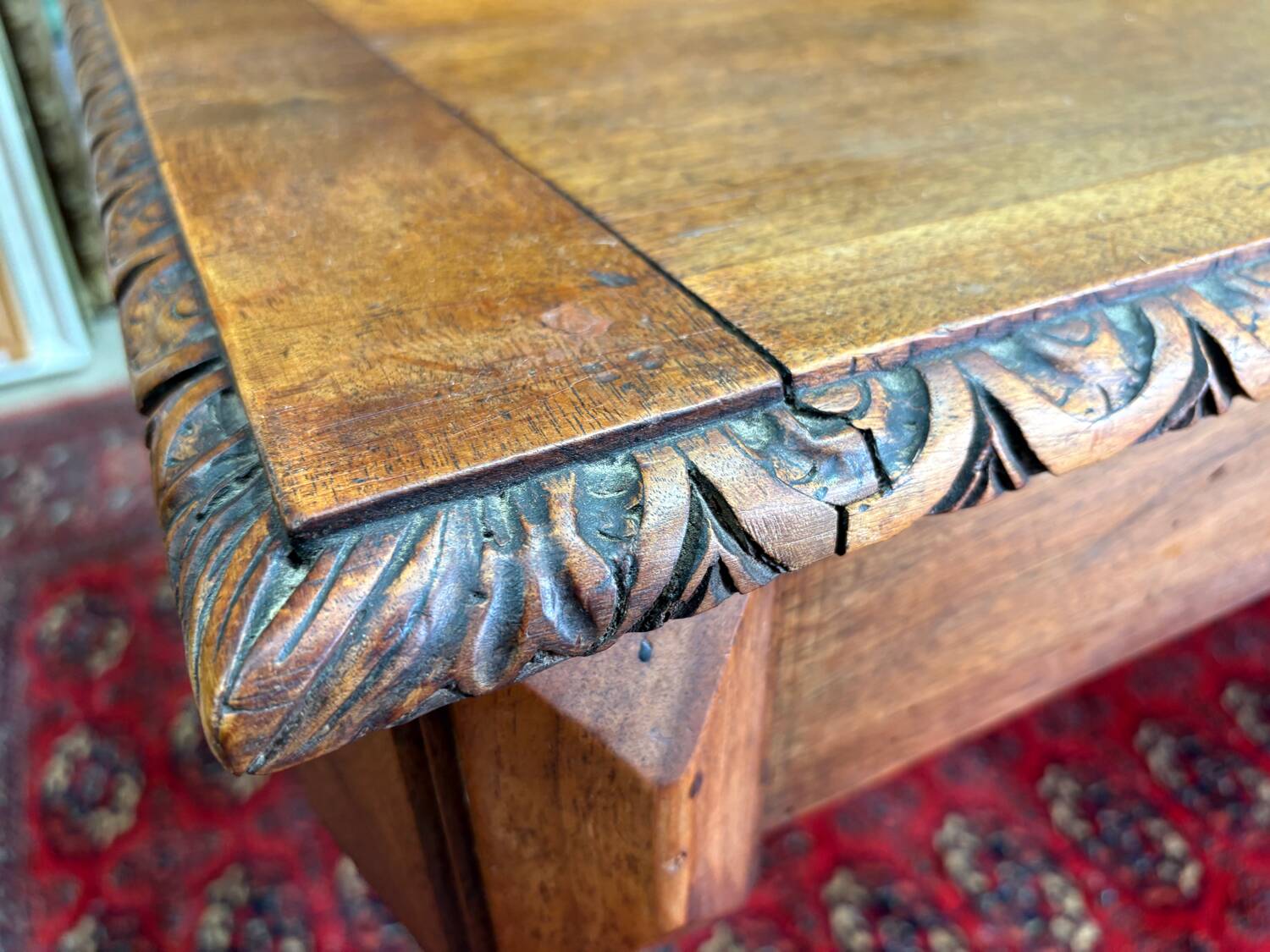 Large antique carved wooden desk in Renaissance style