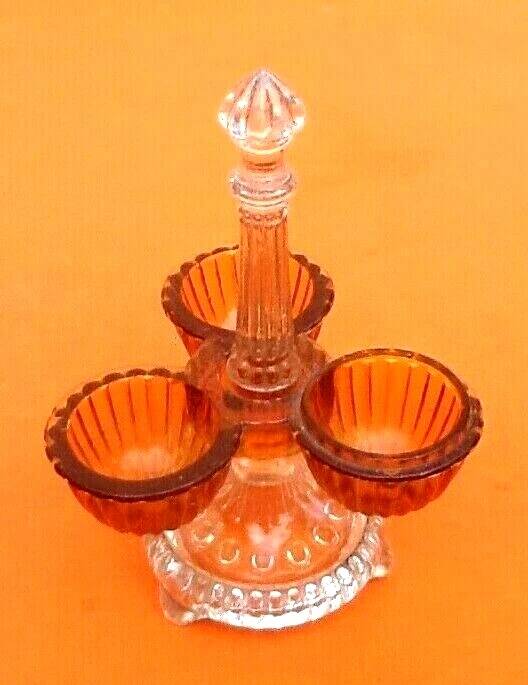 1930s Molded and colored glass condiment spinner