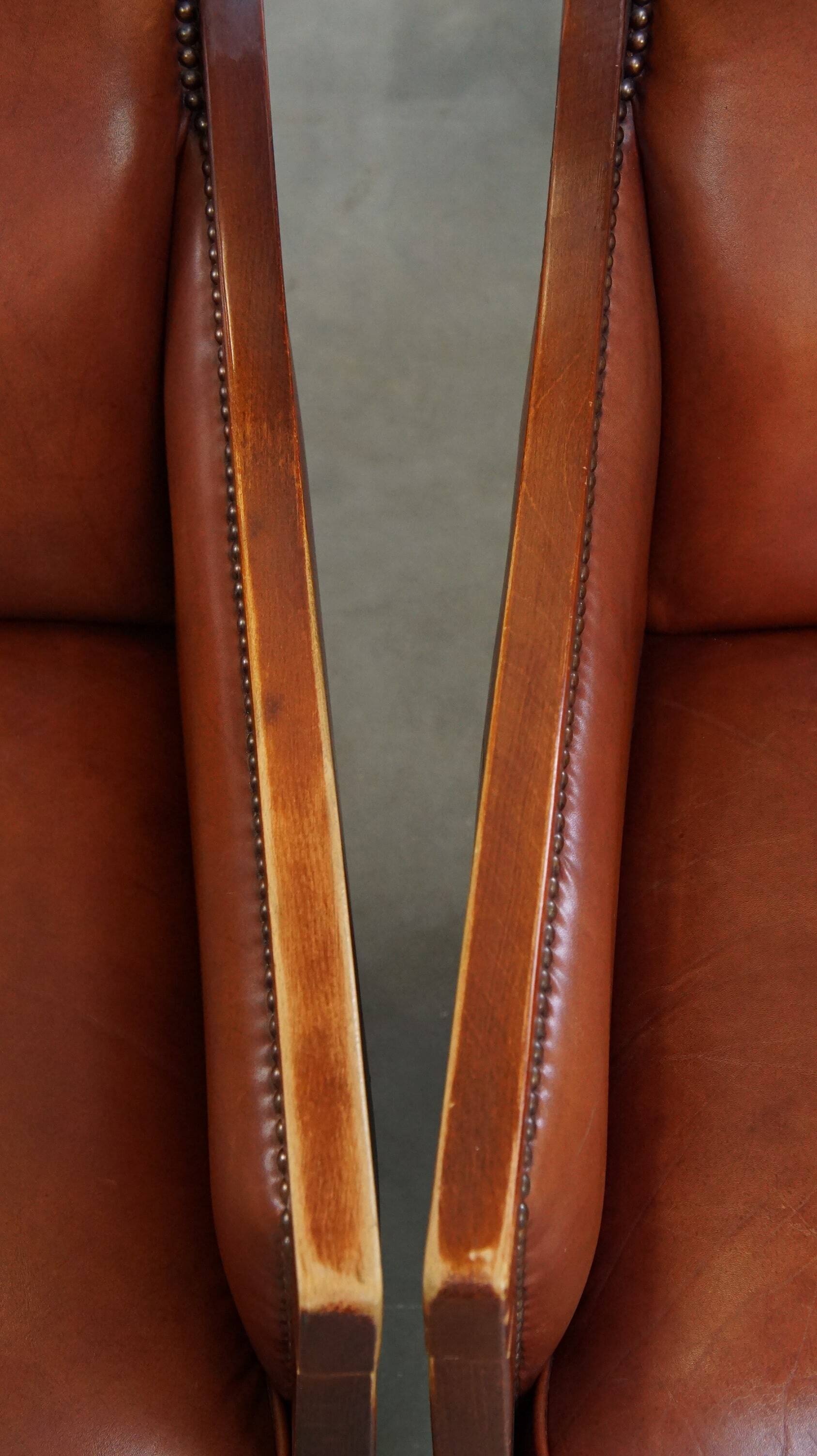 Set of 2 cognac-colored cowhide Art Deco design armchairs