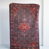 Tapis persan noué main des années 50