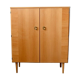Vintage 1960s shoe cabinet in light wood and chrome metal.