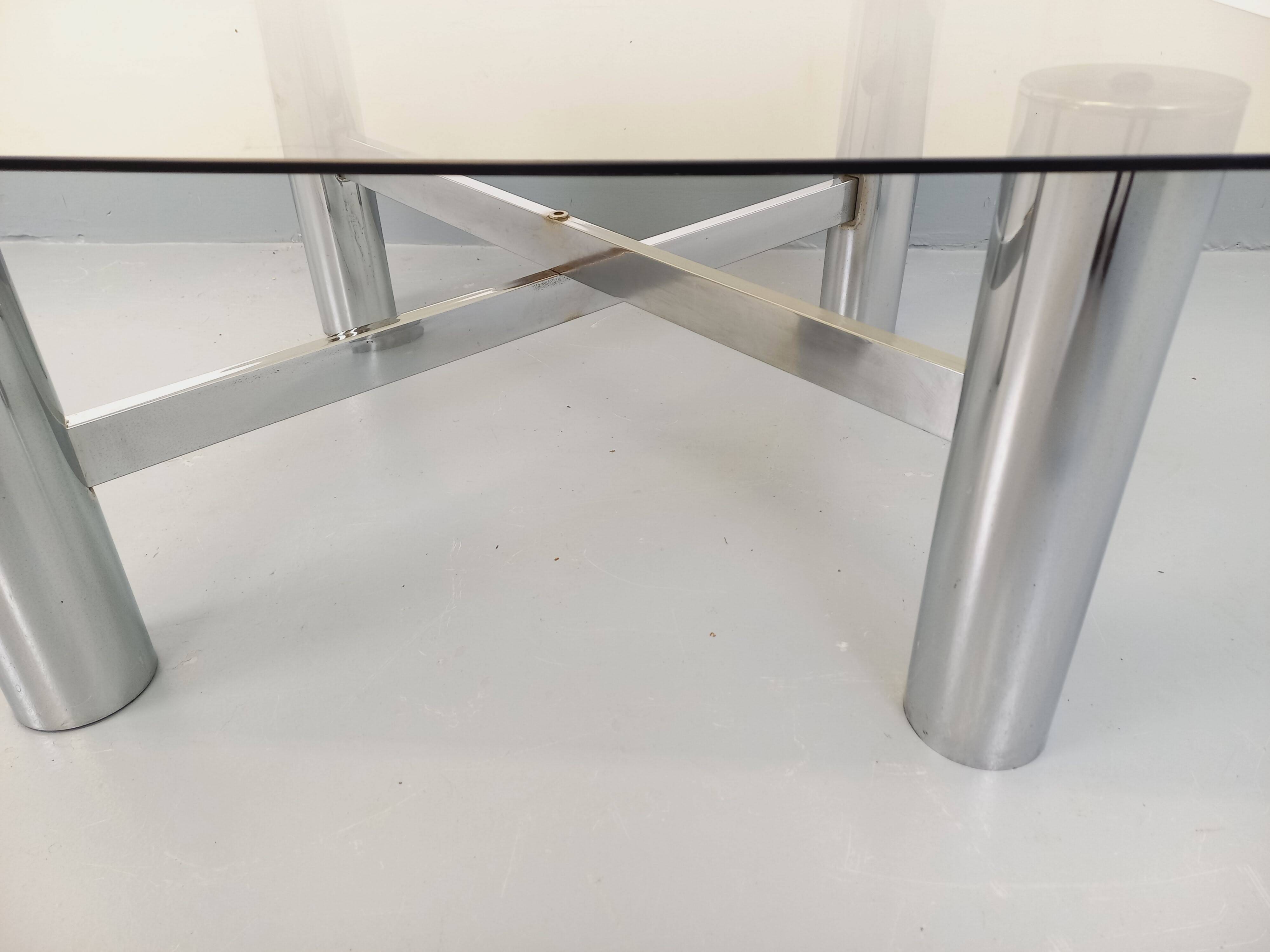 Square Italian vintage Space Age coffee table in smoked glass and metal.