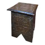 Old stool with vintage carved wood chest