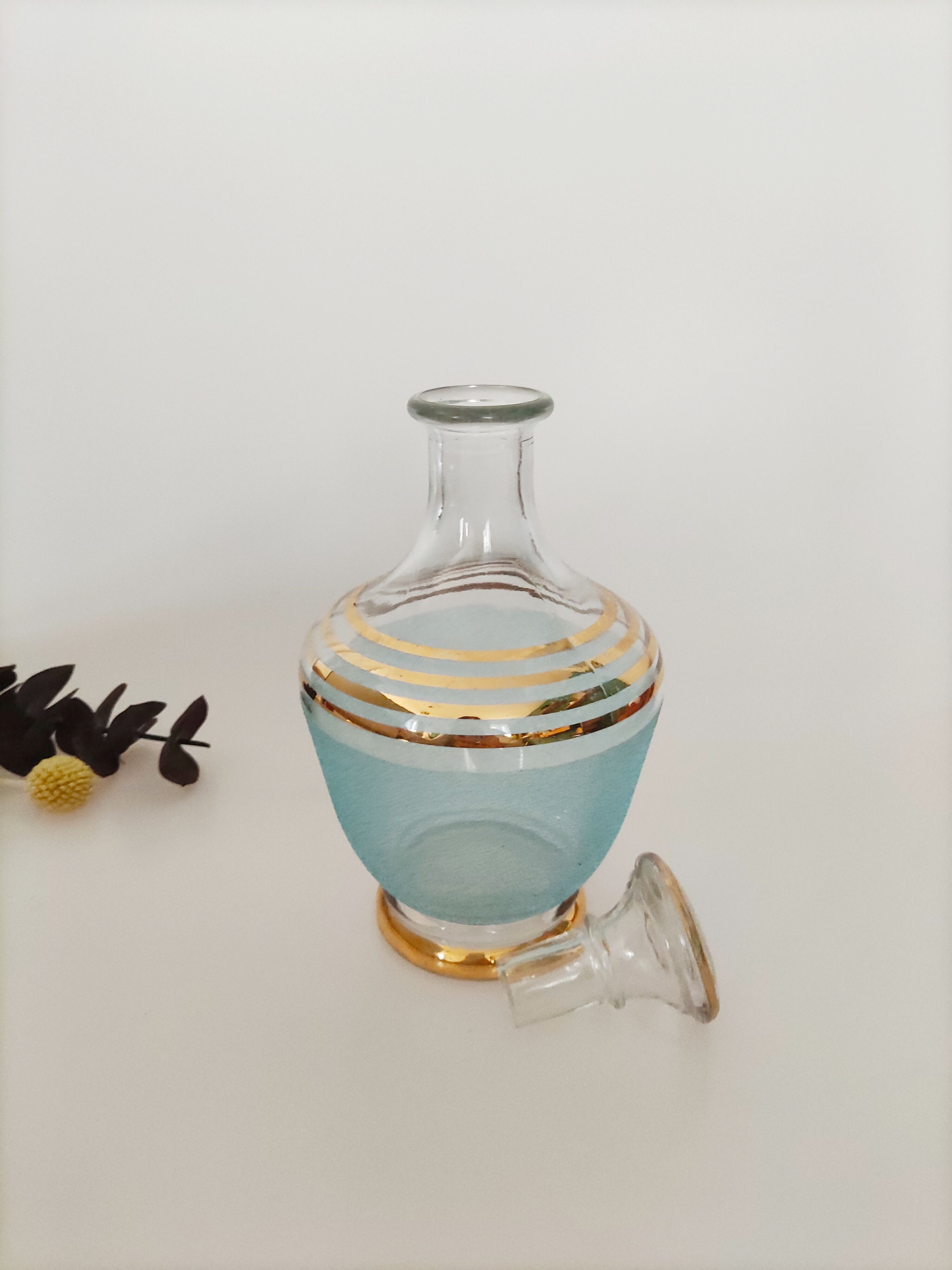 Blue and gold glass decanter